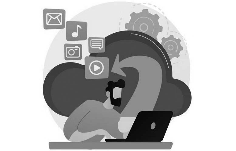 Illustration of a person using a laptop with a large cloud and gears in the background. Icons for email, music, photos, messages, and video float above, representing Portland IT services like cloud computing or Microsoft 365 support.